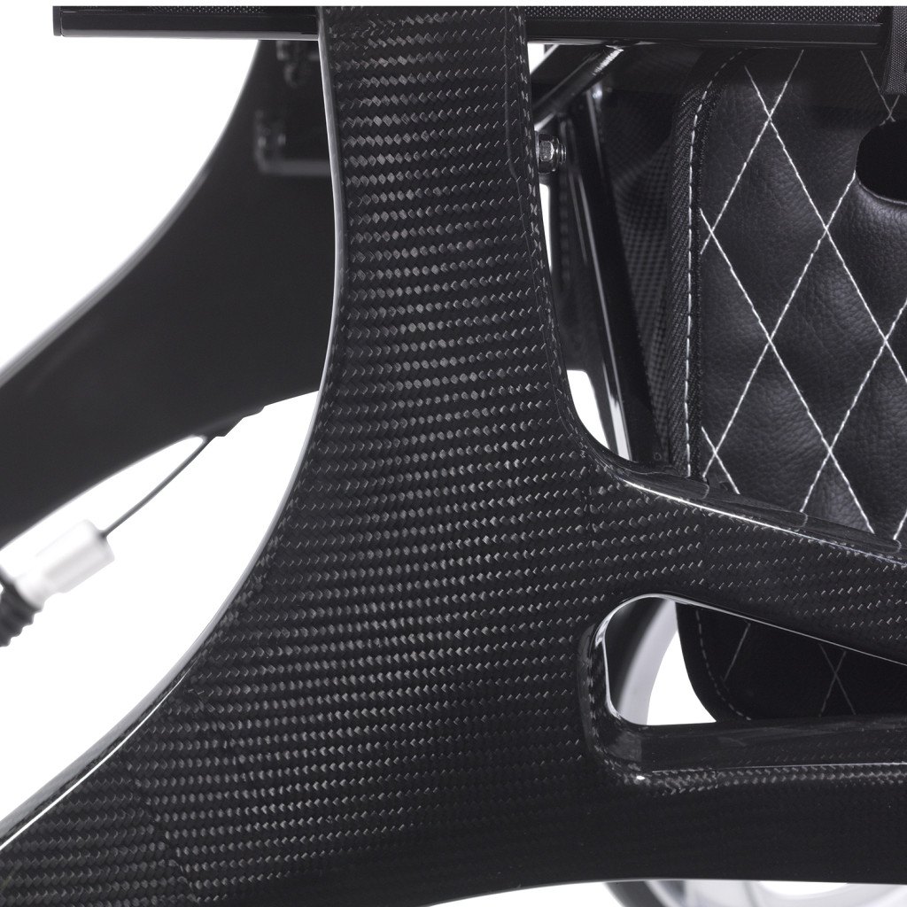 Close-up of the black carbon fiber weave on the Nitro Elite CF frame