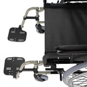 Footplate and front hanger detail on a Quickie M6 wheelchair, with a caster and the armrest