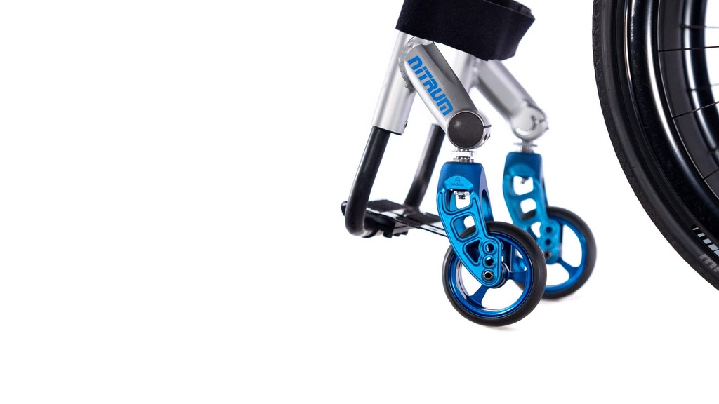 Caster assembly and blue anodized forks on a Quickie Nitrum ultralight wheelchair