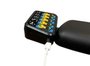 Switch-It CTRL+5 box on an armrest with a USB-C cable plugged in