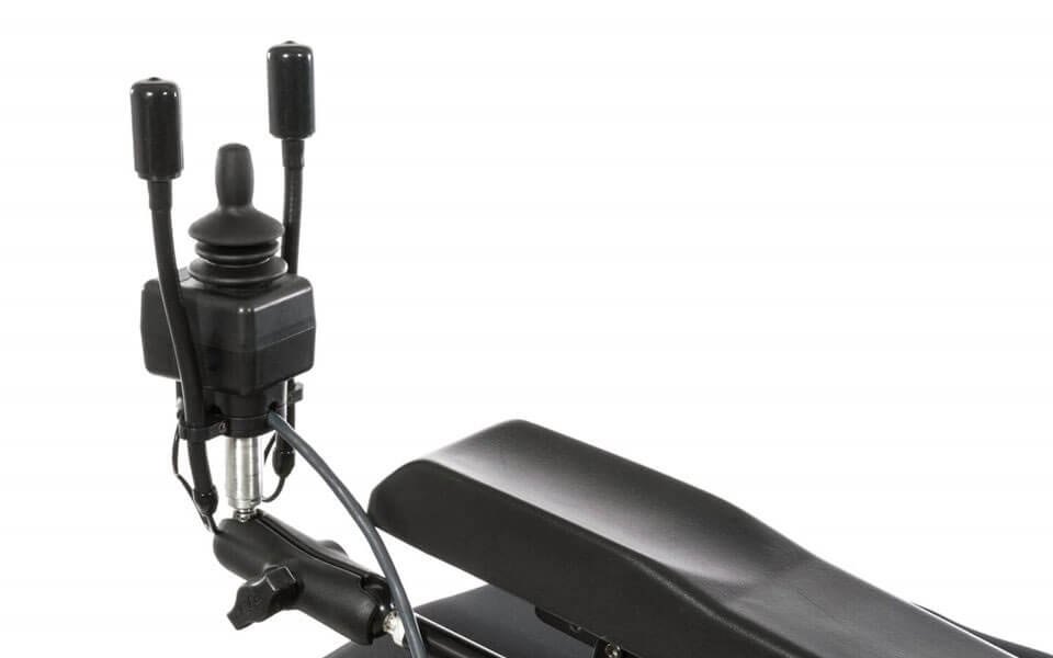 The VersaGuide joystick and two flex switches on an armrest mount