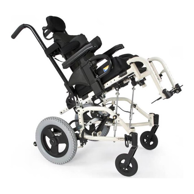 Zippie TS Pediatric Tilt-in-Space Wheelchair. The white TS tipped back, with the footrest frame lifted and the headrest in pl