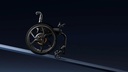 Empulse M90 powered rear wheel on a rigid chair, climbing a slope