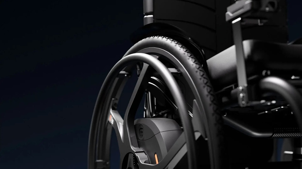 Side view of an Empulse M90 wheel beside the seat and frame