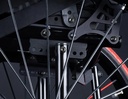 Centre-of-gravity plates and axle hardware on a black RGK AllCourt