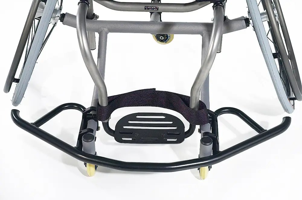 Front wing, footplate and strap on an RGK AllCourt basketball wheelchair