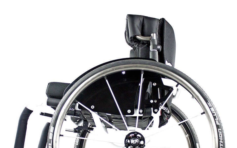 Rear view of an RGK HiLite backrest with padded sides and an RGK hub