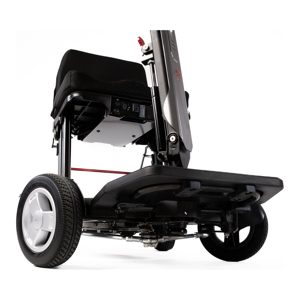 A Helix folding scooter mid-turn indoors, showing its tight 37 in turning circle