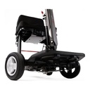 A Helix folding scooter mid-turn indoors, showing its tight 37 in turning circle