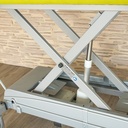 Scissor lift and drive of the MONA care and treatment table under the padded top