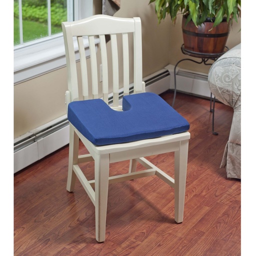 Drive coccyx foam cushion in its cover on a white dining chair