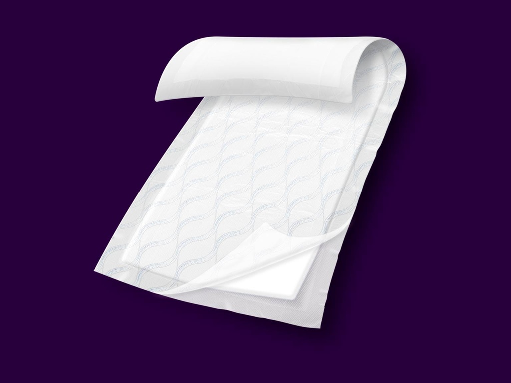 A single Depend Night Defense underpad showing its soft quilted top layer