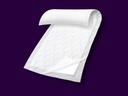 A single Depend Night Defense underpad showing its soft quilted top layer