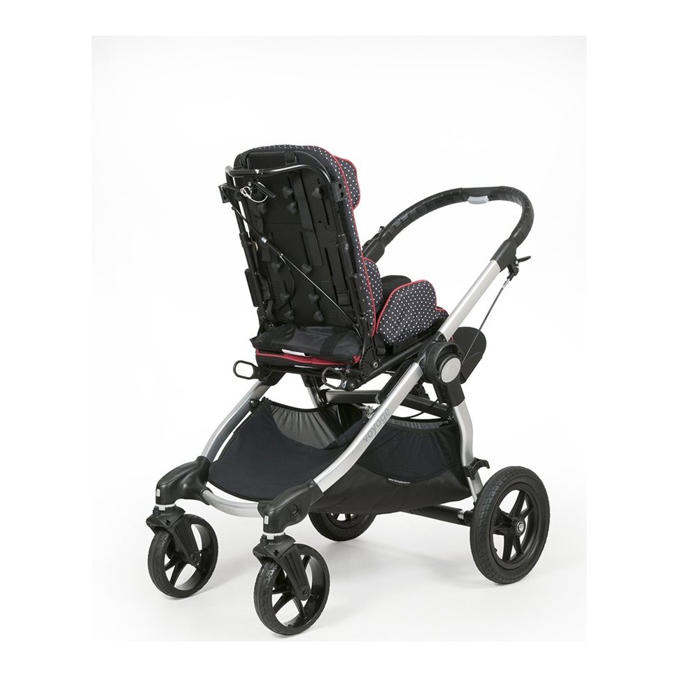 Zippie Voyage seat turned toward the caregiver, canopy off, basket below
