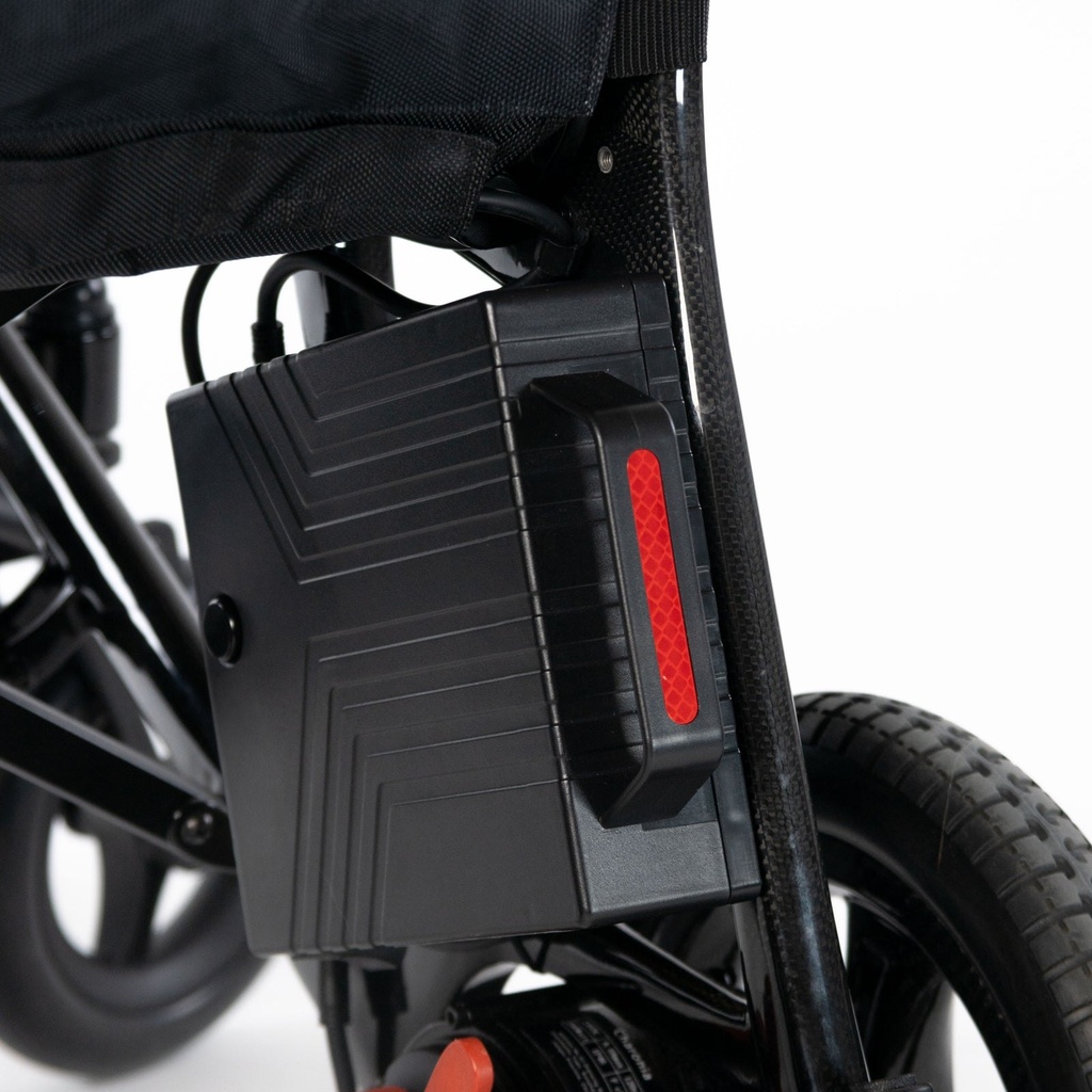 Battery bay on the Aerolux 2C frame with the pack fitted and the red reflector, carbon weave visible