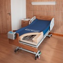 PressureGuard APM2 Safety Supreme on a bed, blue cover open over the raised side.