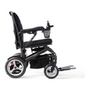 Dash 3 folding power chair from the right side, showing the 12 in rear wheels and footplate