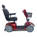 Red Avenger 4-wheel scooter from the left, showing the seat and wide foot deck