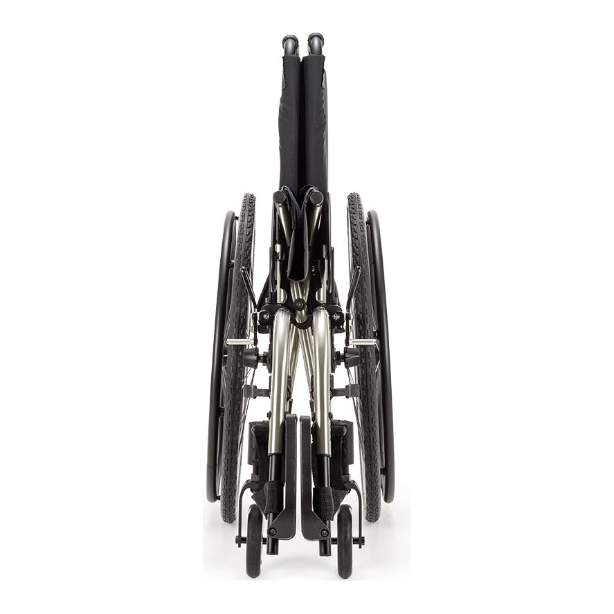 Catalyst 5Ti titanium folding wheelchair folded and seen from the front, showing how narrow it packs