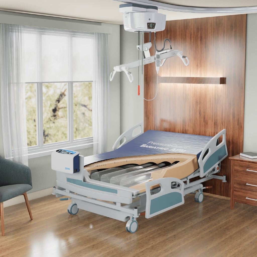 PressureGuard Bariatric APM in a room with a ceiling lift, mattress open at the foot.
