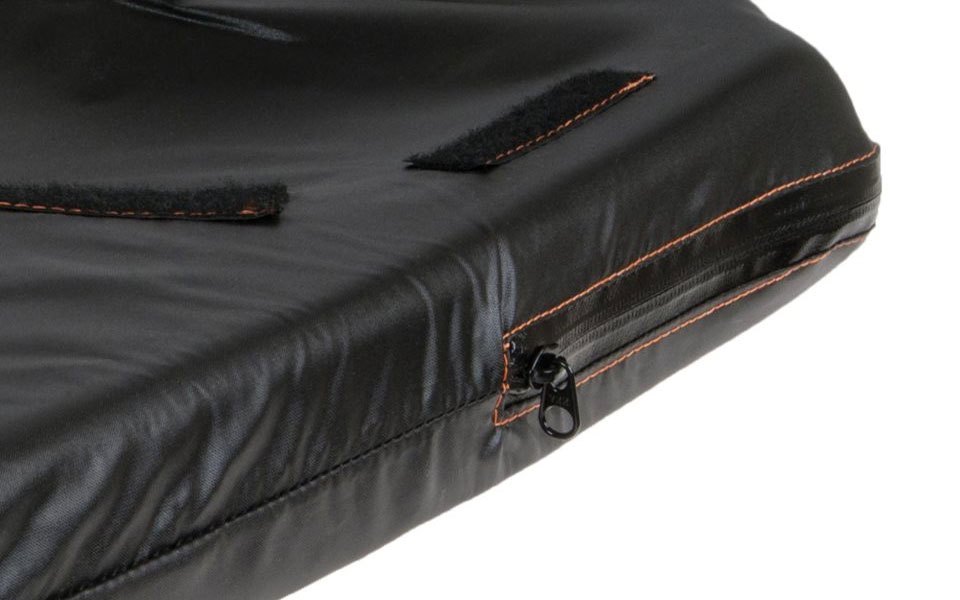 Close view of the JAY X2 inner cover: water resistant zipper, orange stitching and Velcro strips
