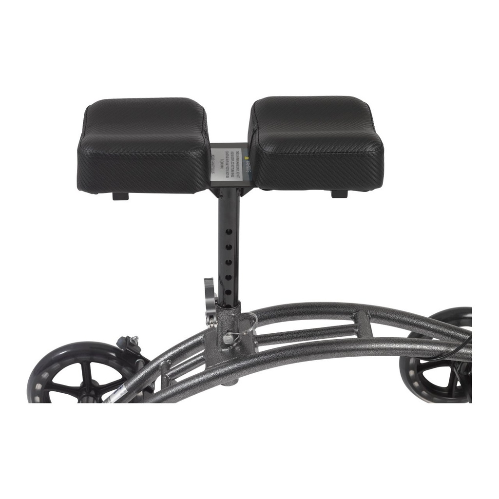 Two-piece padded knee rest and height post on the steel frame