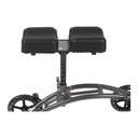 Two-piece padded knee rest and height post on the steel frame
