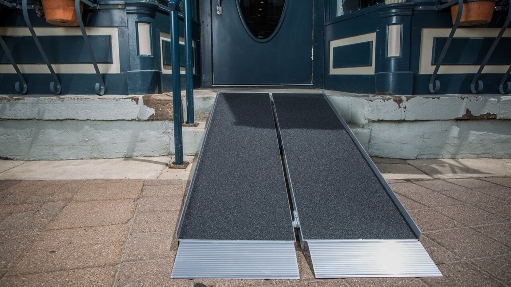 SUITCASE Singlefold AS ramp set up as two sections over a porch step