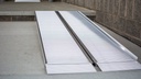 EZ-ACCESS SUITCASE extruded singlefold ramp resting on a step at a doorway