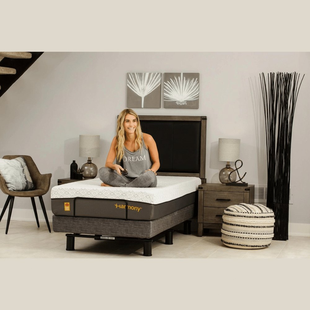Person seated on a Harmony 3 adjustable base while the head is raised