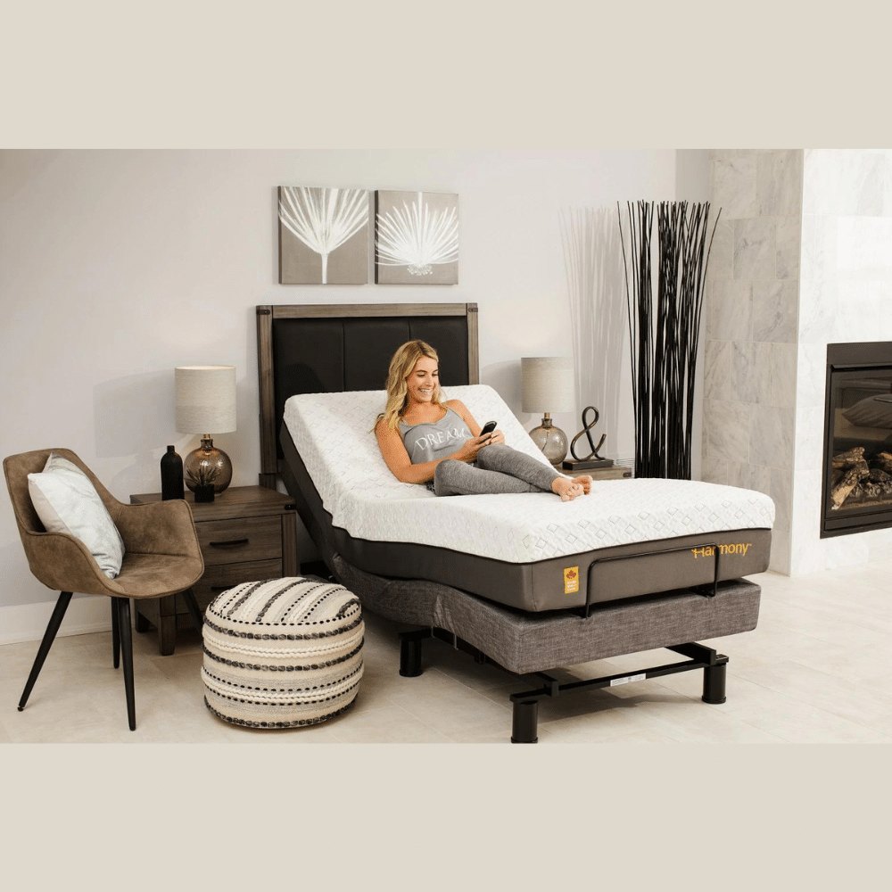 Person resting on a Harmony 3 adjustable base with the head section up