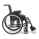 Catalyst 4E wheelchair from the side, showing its rear wheel, arm pad, axle plate and caster