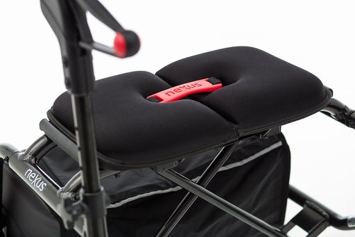 Angled view of the Human Care seat pad fitted above the rollator bag