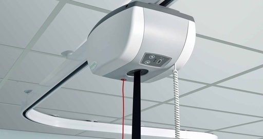 Ceiling lift motor riding a curved white Savaria FastTrack rail