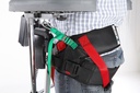 Green gait-kit strap and carabiner on a Bure Rise and Go, beside the separate black belt