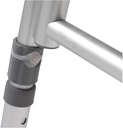 Push-pin collar on a transfer bench leg, with the adjustment holes below