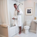 Man in a bathrobe stepping out of the bathtub while holding the pole and the SuperBar