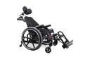 Example tilt wheelchair with a headrest and swing-away footrests, side view
