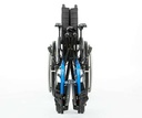 Blue Quickie QX folded side to side, seen from the front with its footplates flipped up
