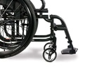 Front frame of a black Quickie 2 with a swing-away footrest, footplate, caster and fork