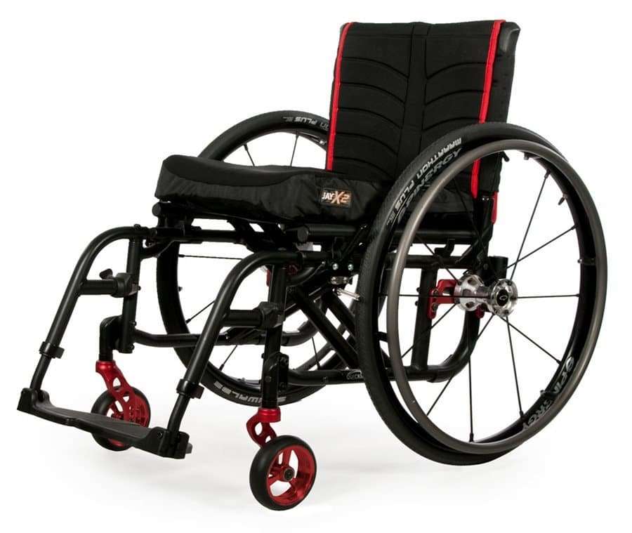 Black Quickie 2 with red anodized caster forks and axle plate and a JAY X2 seat cushion