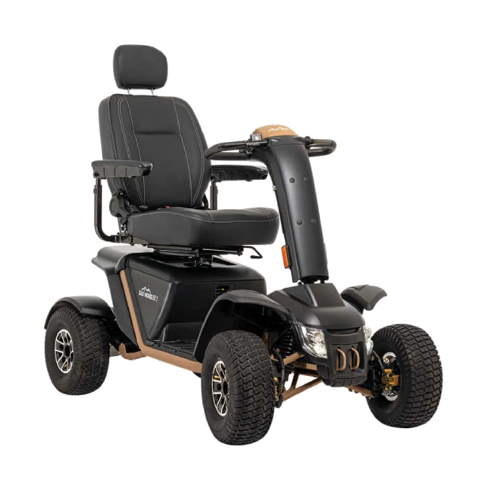 Pride Baja Wrangler 2 in Desert Sand, front three-quarter view with its pneumatic tires
