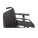 Close view of an armrest raised on its height post above the black side panel